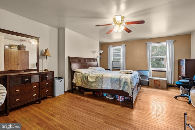 bedroom featuring ceiling fan and light wood-type flooring