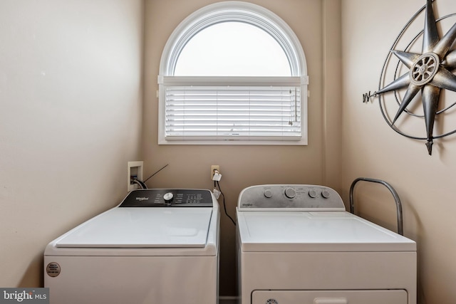 laundry area featuring independent washer and dryer