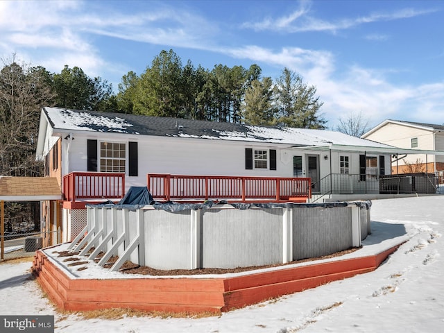 view of snow covered property