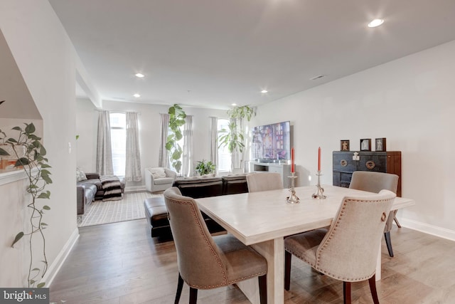 dining space featuring hardwood / wood-style flooring