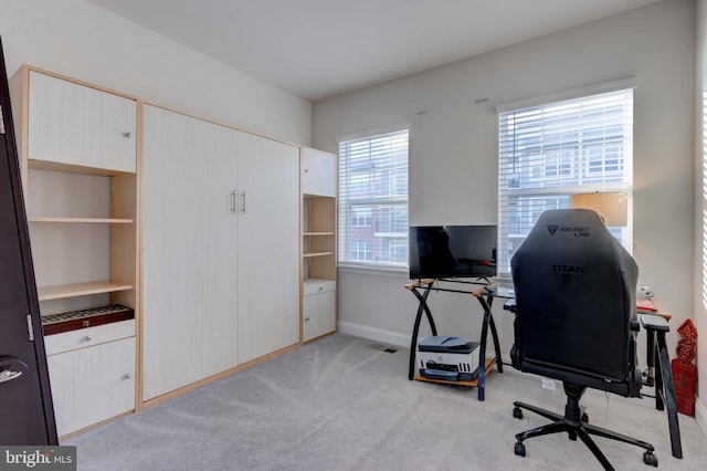 home office with light carpet