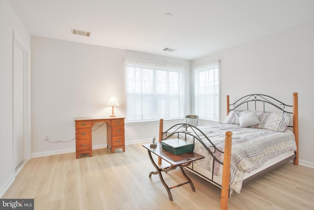 bedroom with light hardwood / wood-style flooring