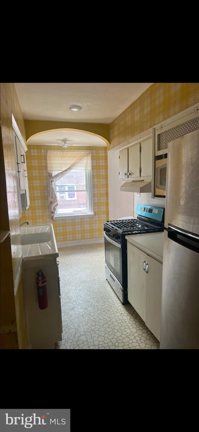 kitchen featuring appliances with stainless steel finishes and sink