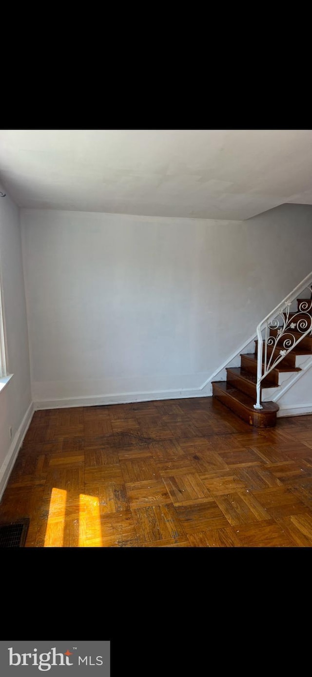 interior space with parquet flooring