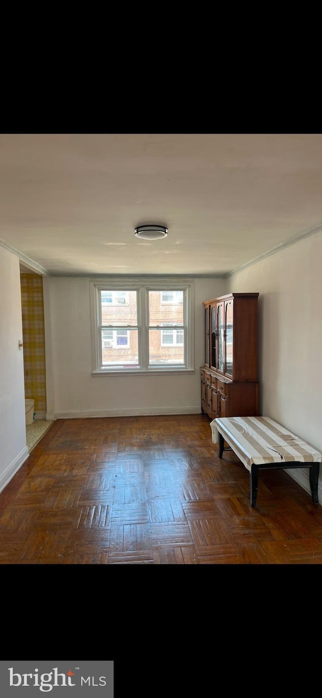 interior space featuring dark parquet floors