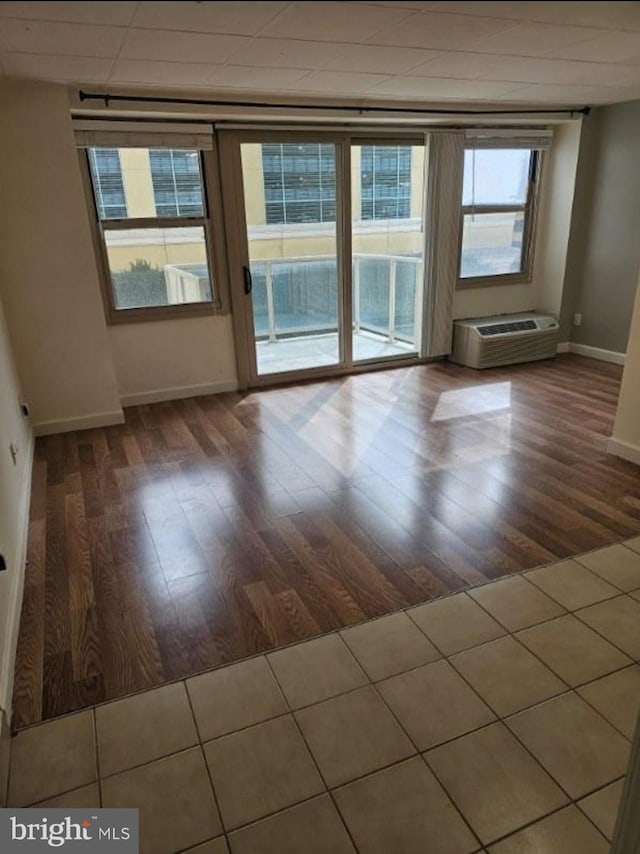 unfurnished room featuring dark hardwood / wood-style floors