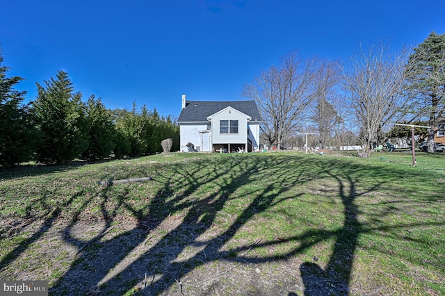 exterior space with a yard