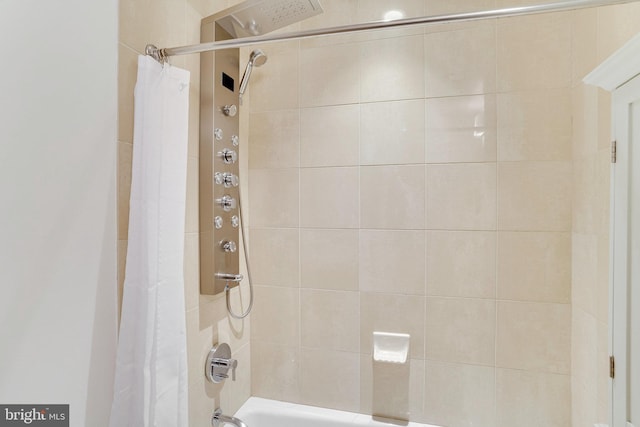 bathroom with shower / bathtub combination with curtain