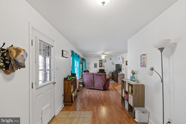 interior space featuring ceiling fan and hardwood / wood-style floors