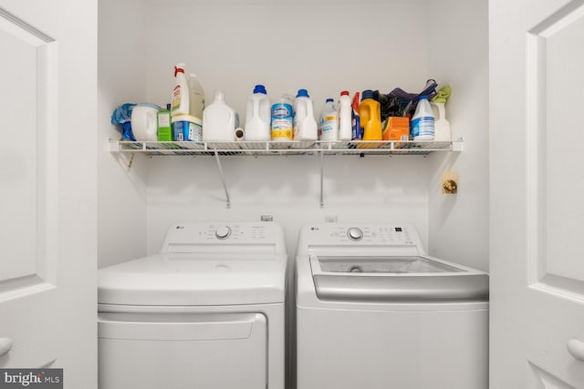 laundry room featuring washing machine and dryer