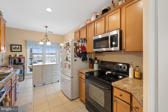 kitchen with light tile patterned flooring, decorative light fixtures, black electric range oven, sink, and white refrigerator