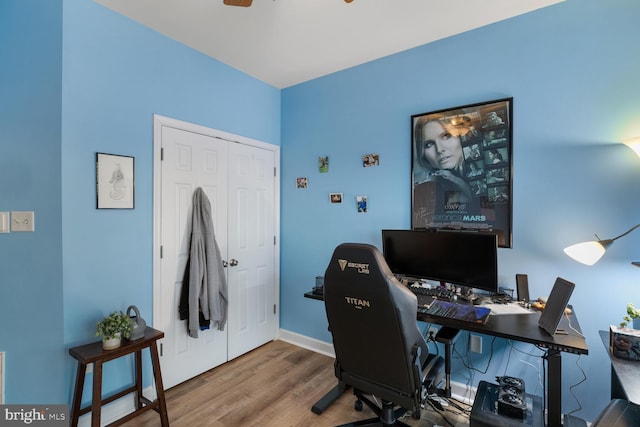 office area with wood-type flooring and ceiling fan