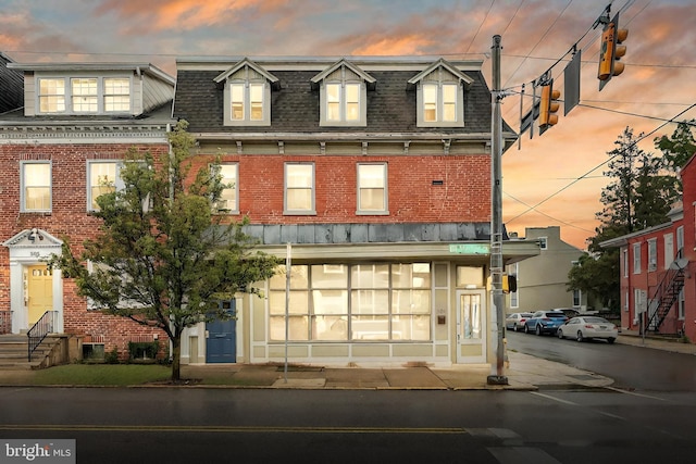 view of property at dusk