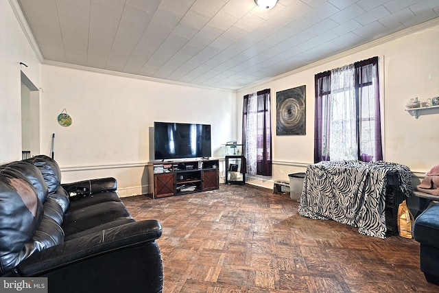 living area featuring ornamental molding