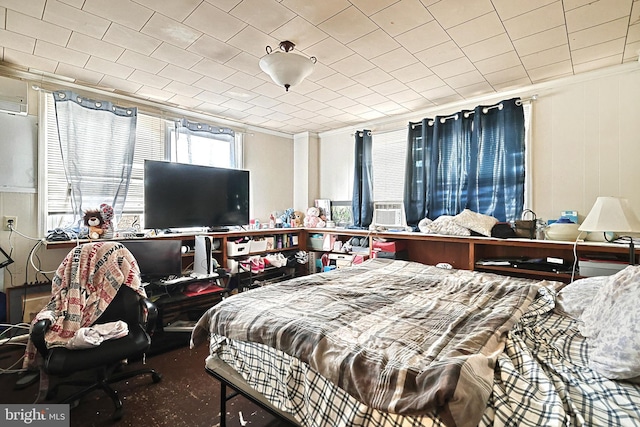 bedroom featuring crown molding