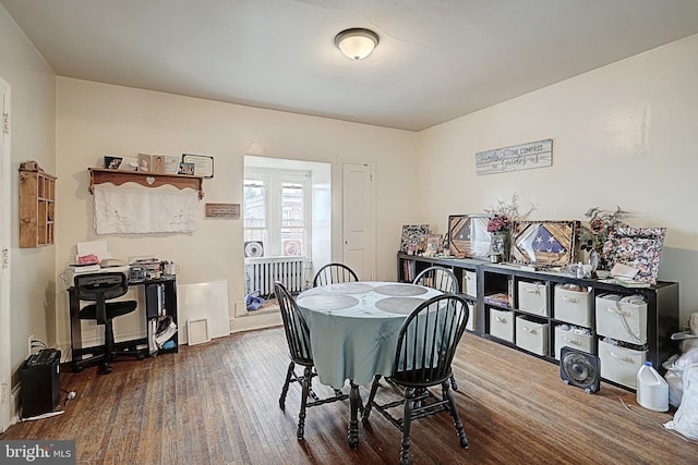 dining room with wood finished floors