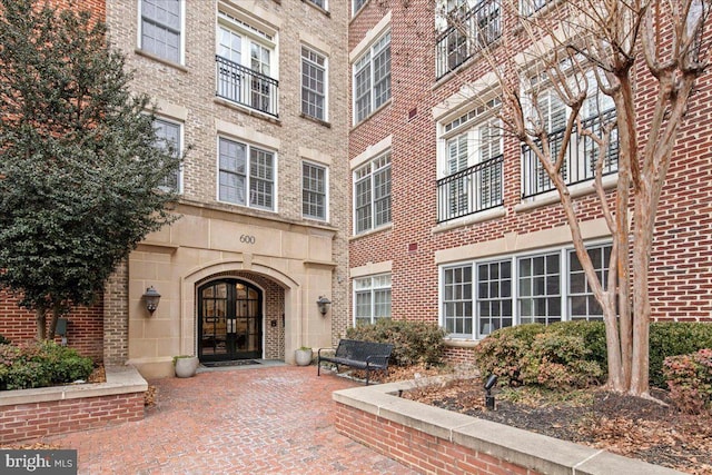 property entrance featuring french doors