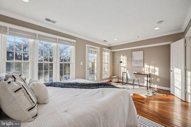 bedroom with access to outside, hardwood / wood-style floors, and ornamental molding