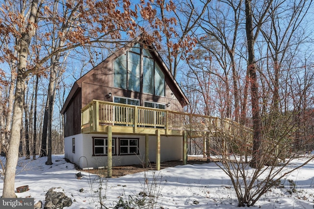 view of snow covered house