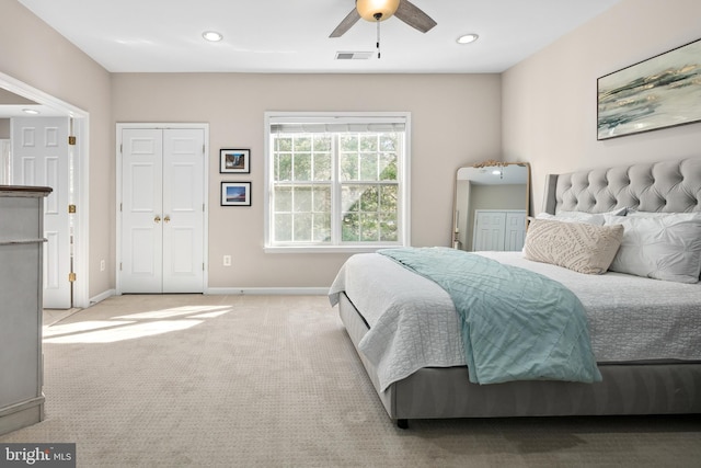 carpeted bedroom featuring ceiling fan