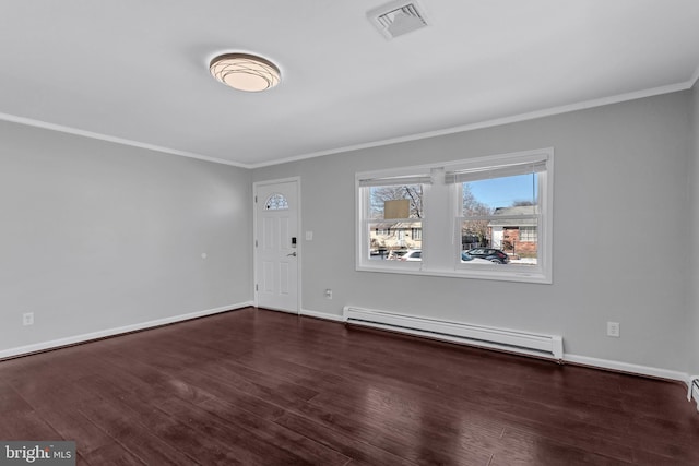 empty room with a baseboard heating unit, dark wood-type flooring, and crown molding