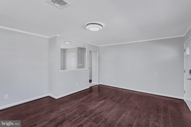 unfurnished room with wood-type flooring and ornamental molding