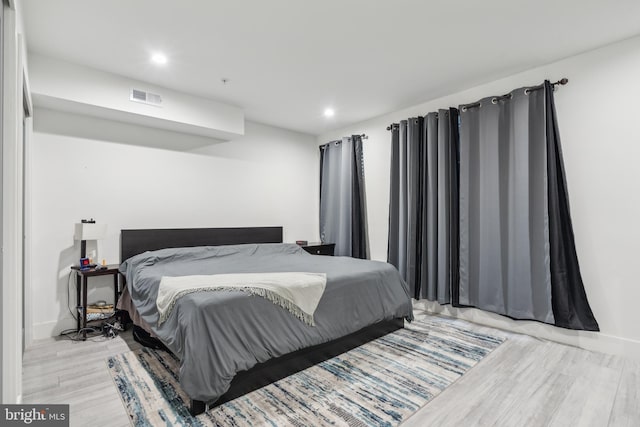 bedroom featuring light hardwood / wood-style floors