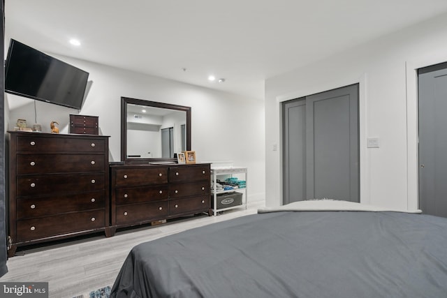 bedroom featuring light hardwood / wood-style floors