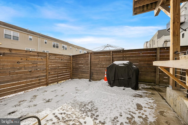 view of yard covered in snow