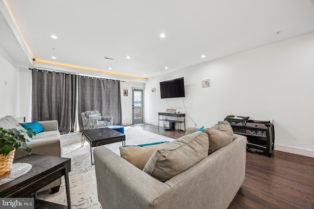 living room featuring dark hardwood / wood-style floors