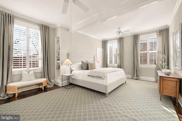 bedroom with crown molding, wood-type flooring, and ceiling fan