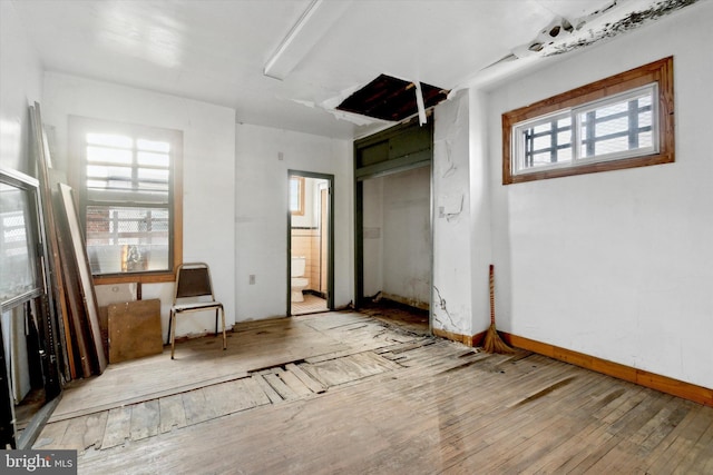 spare room featuring light wood-type flooring