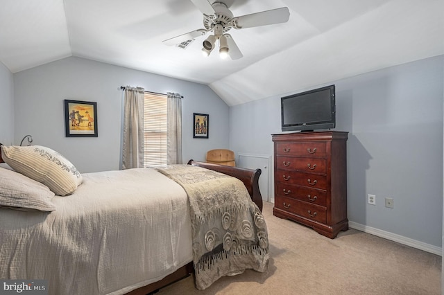 bedroom featuring lofted ceiling, light carpet, and ceiling fan