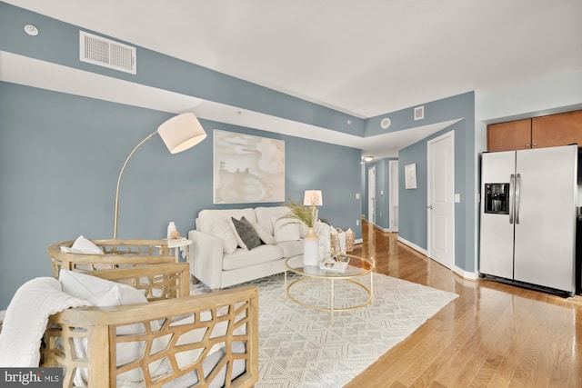 living room with light wood-type flooring