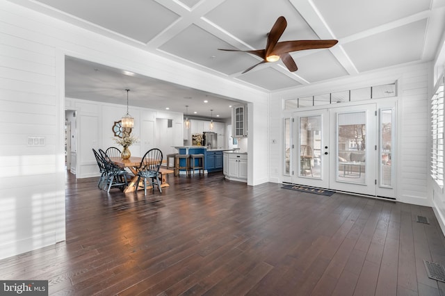 living room featuring coffered ceiling, french doors, ceiling fan, and dark hardwood / wood-style floors