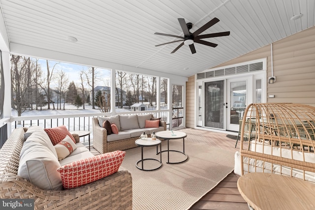 sunroom with wooden ceiling, vaulted ceiling, and ceiling fan