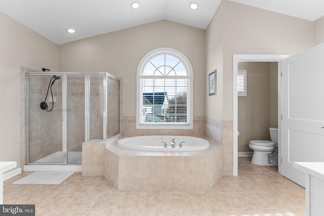 bathroom with plus walk in shower, toilet, tile patterned floors, and lofted ceiling