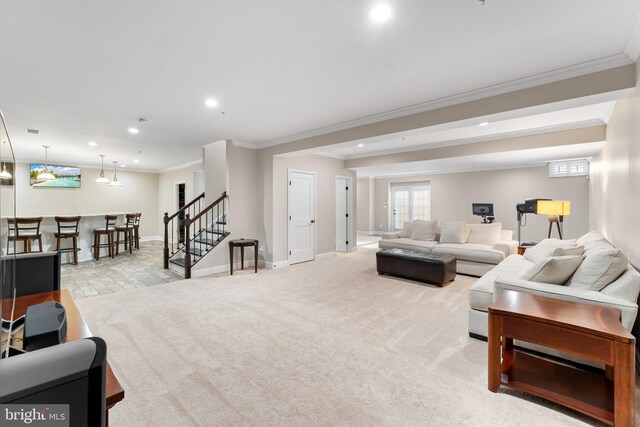 living room featuring ornamental molding and light colored carpet