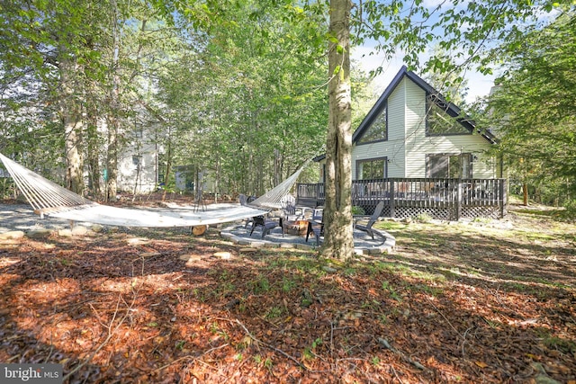 view of yard with a deck