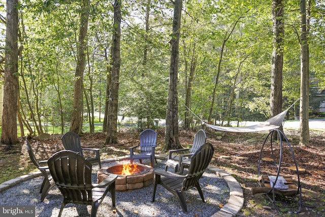 view of patio featuring an outdoor fire pit