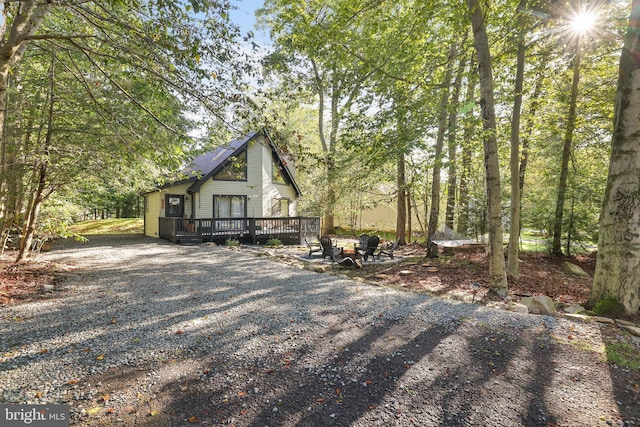 exterior space featuring a wooden deck