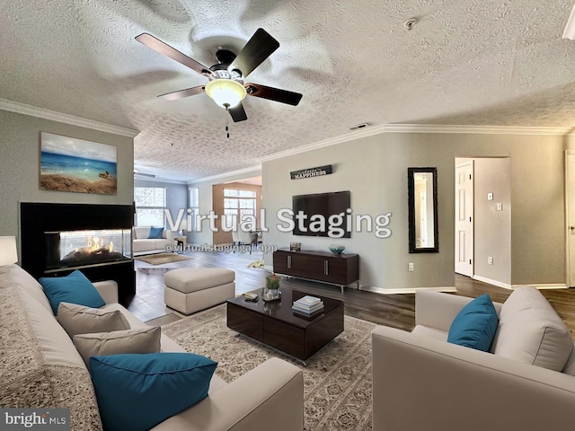 living room featuring wood-type flooring and ornamental molding