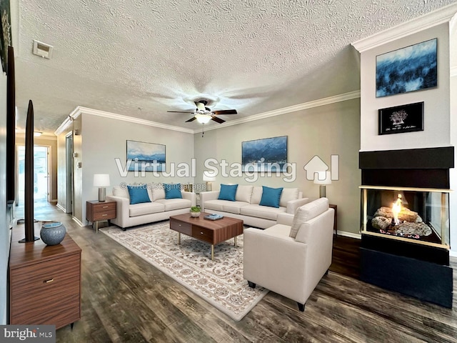 living room featuring hardwood / wood-style floors and ornamental molding