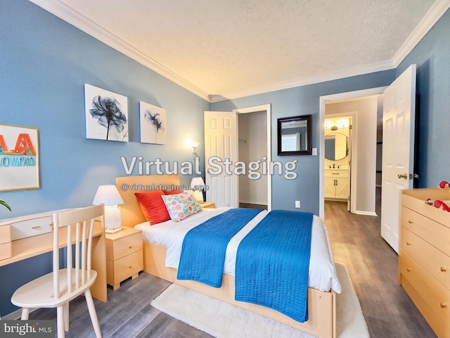 bedroom featuring crown molding, dark hardwood / wood-style floors, and a textured ceiling