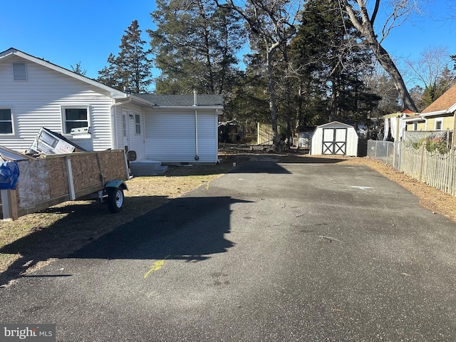 exterior space featuring a storage shed