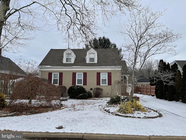 view of new england style home