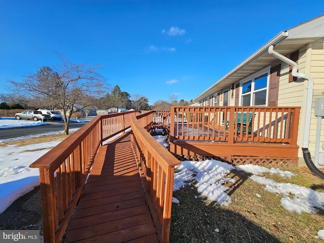 view of snow covered deck