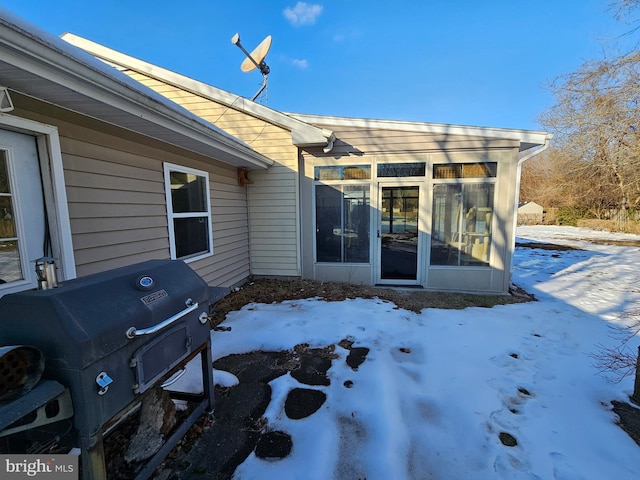 view of snow covered property