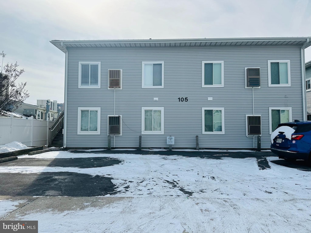 view of snow covered house