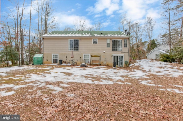 view of snow covered property